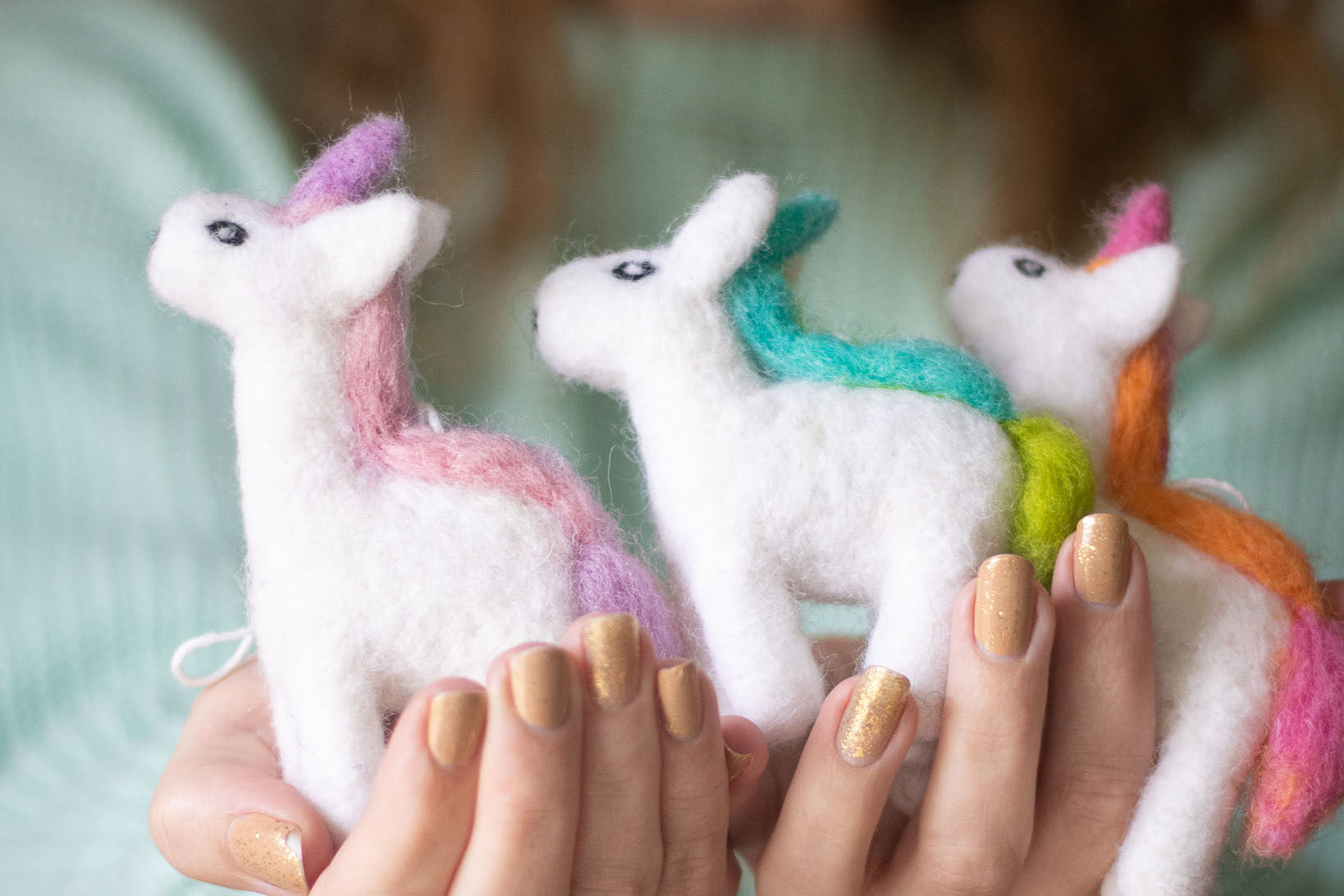 3 handmade white wool unicorns with rainbow manes